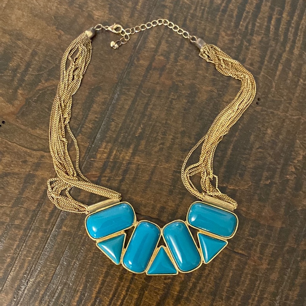 Gold necklace with teal statement